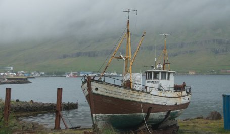 A fishing boat on a dock.